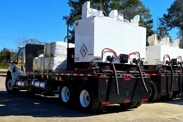 Ozark Striping supply truck loaded with thermoplastic materials and striping equipment ready for pavement marking deployment